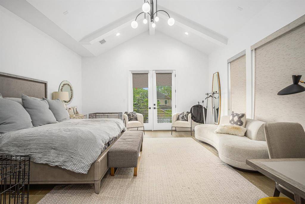 Expansive upstairs primary suite with its own private balcony — the perfect retreat for morning coffee or evening relaxation