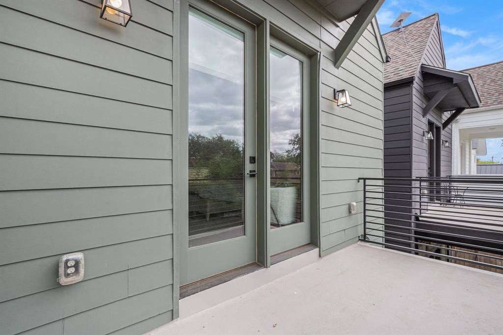 Enjoy fresh air and added privacy with a balcony off the primary bedroom