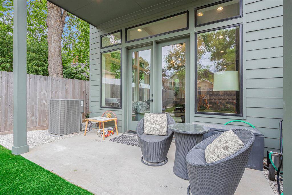 Enjoy the outdoors in comfort with a covered backyard patio perfect for entertaining