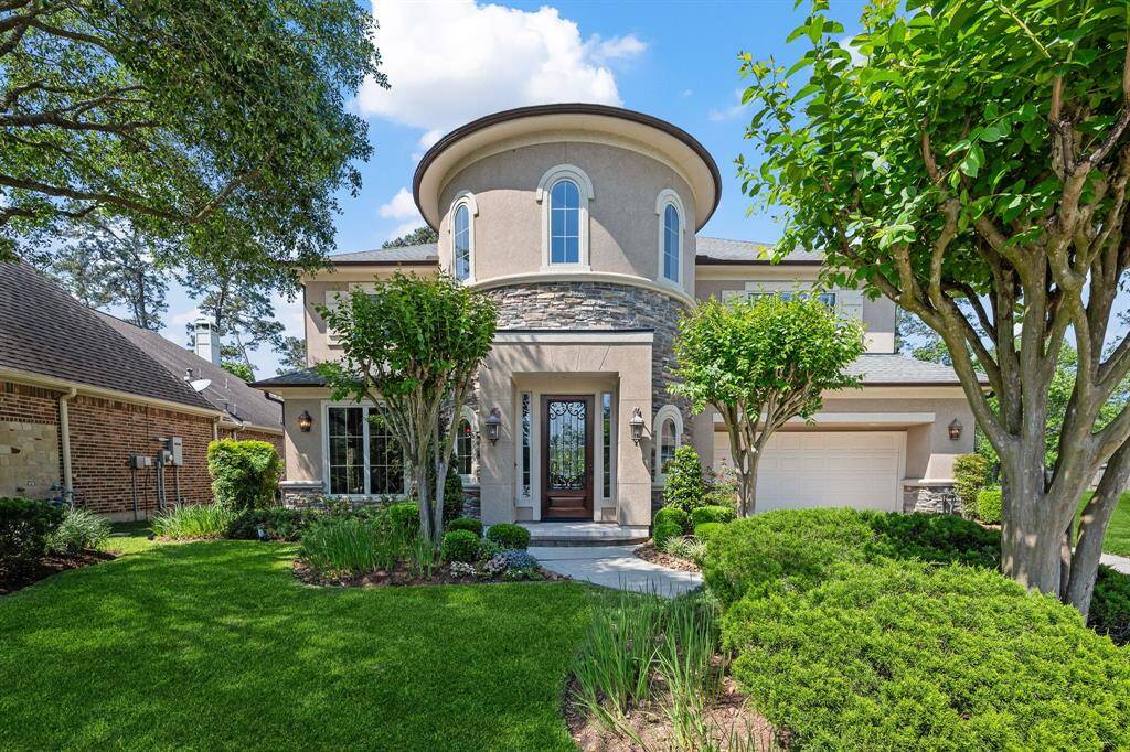 Welcome to this stunning Mediterranean-style home, where elegant architecture meets lush landscaping. Featuring a grand turret entry, detailed stonework, and beautifully manicured gardens, this impressive residence makes a captivating first impression from the moment you arrive.