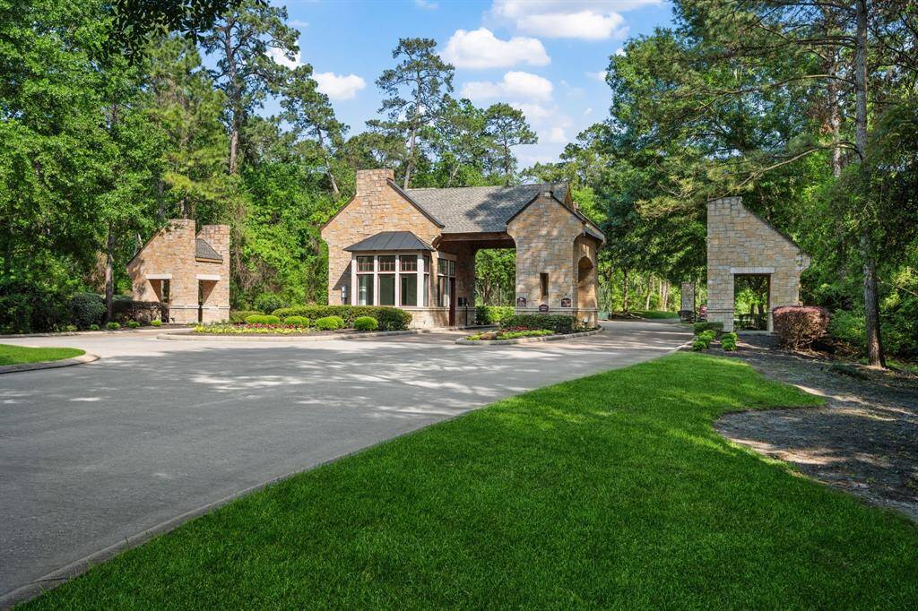 Welcome to luxury living behind the gates of this prestigious community. This beautifully landscaped entrance with timeless stone architecture offers residents both privacy and elegance, setting the tone for the serene lifestyle that awaits within.