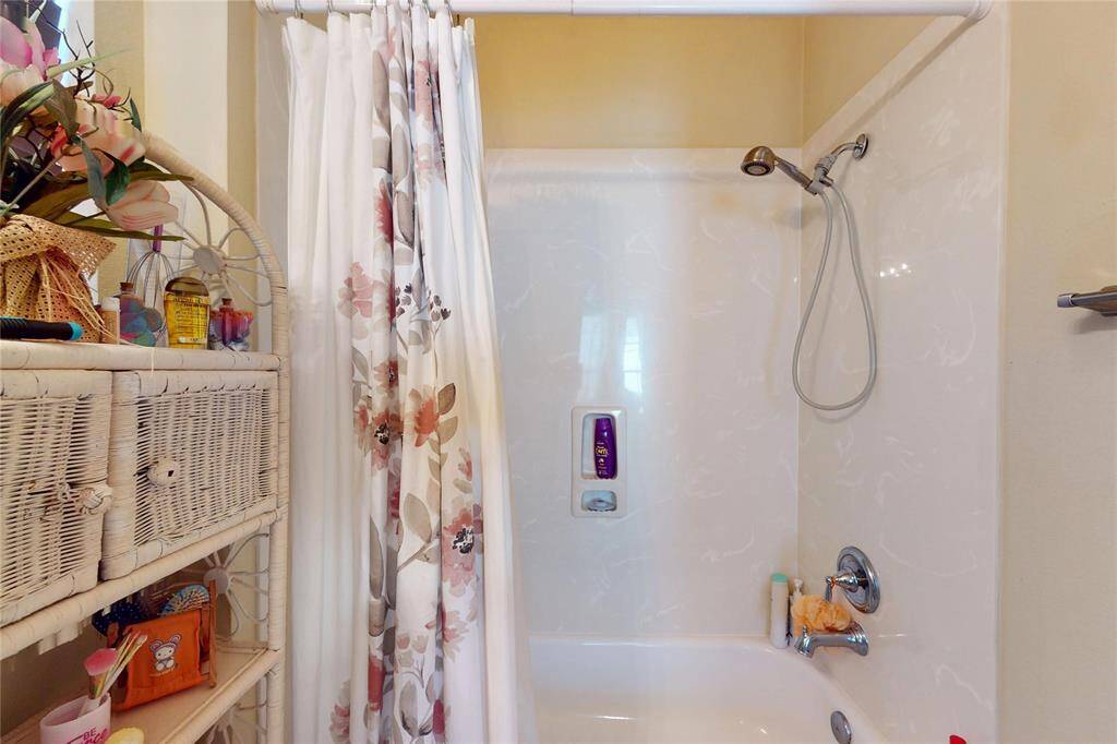 Another view of the shower/tub of the second bathroom.