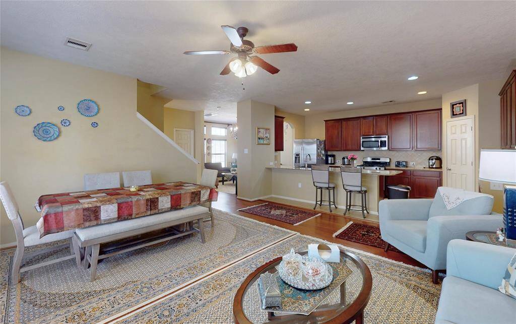 A view of the livingroom area toward the kitchen and please note the formal diningroom further in the pictures, which is now being used for a second living room area.