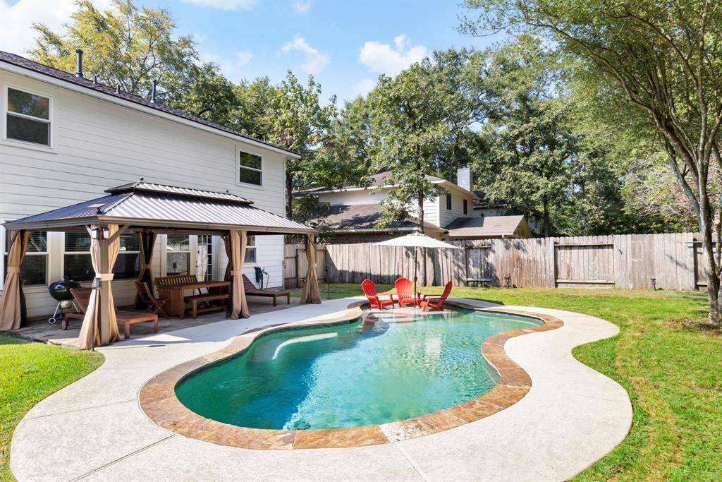 Great backyard with pergola and heated pool