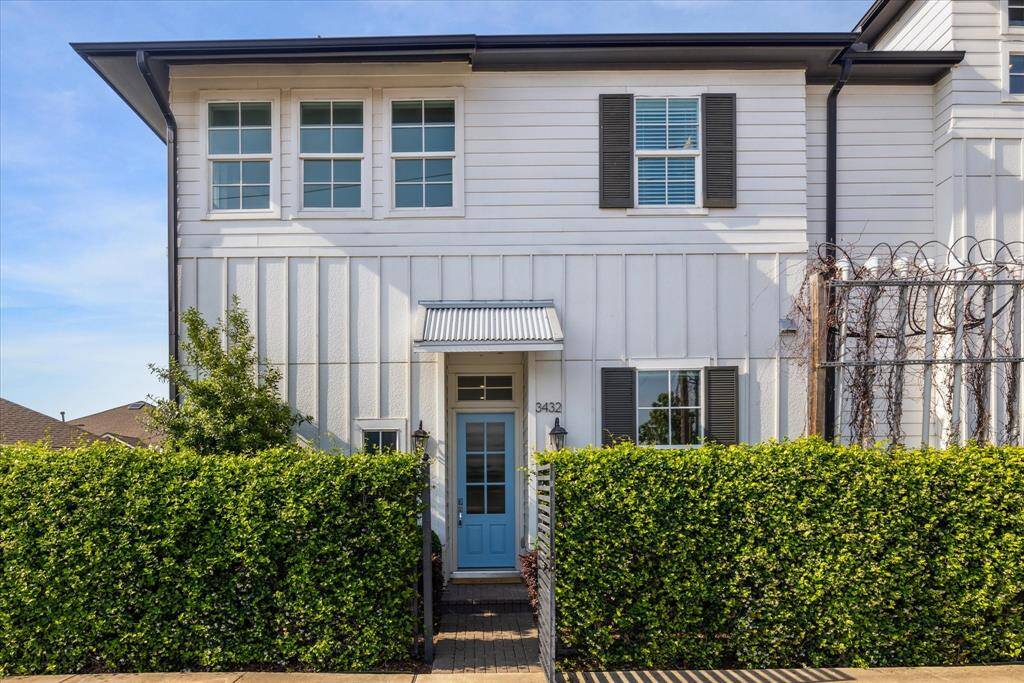 Love the 8 ft mahogany front door! And the farmhouse look comes with easy maintenance fiber cement siding in board & batten and stucco style.