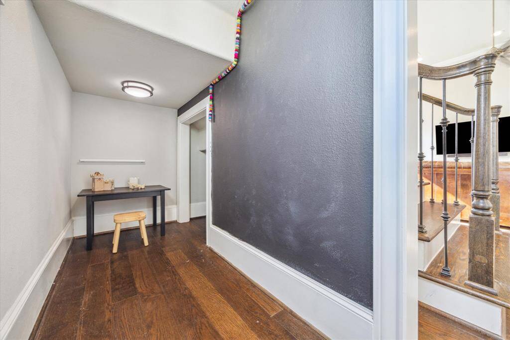Next to the front door and under the stairs is this wonderful little space for the kiddos -- or Fido! And it continues further to the right as well.  :)