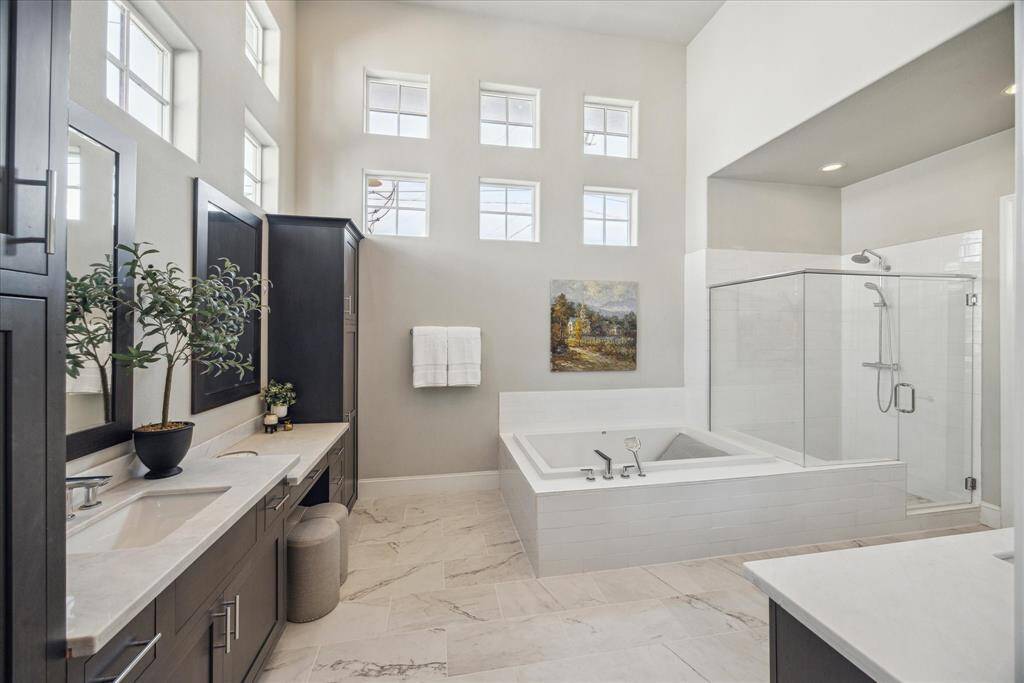 Sleek and sophisticated details create this spa-like space. And the clerestory windows above provide ample natural light.