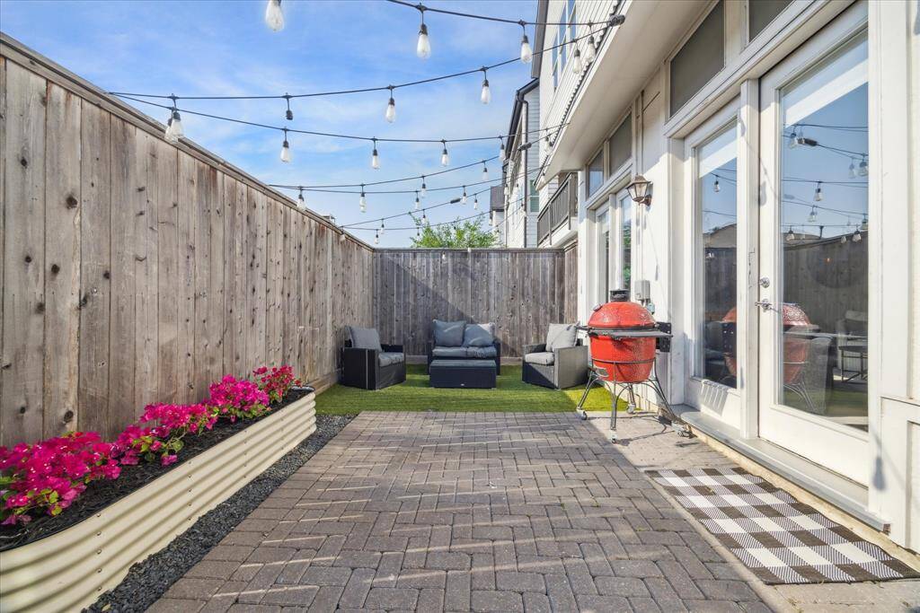 And you'll enjoy this fantastic back yard patio, complete with easy-maintenance turf.