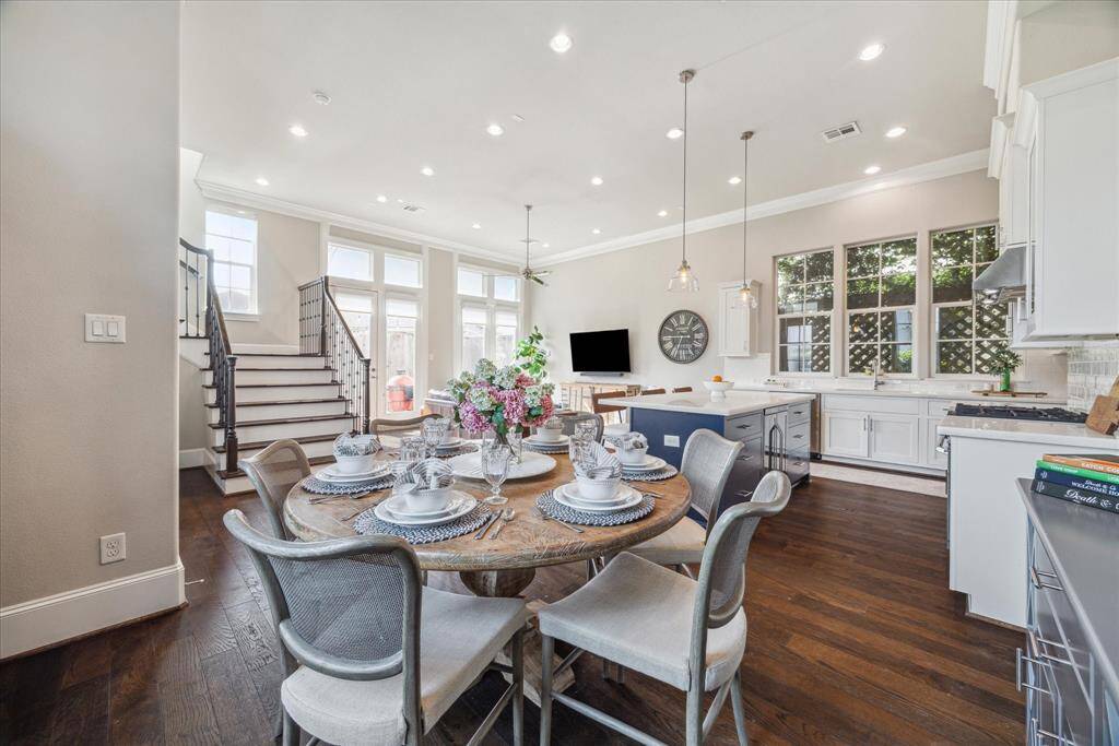 Expansive view of this lovely room.  You'll be delighted at all the natural light!