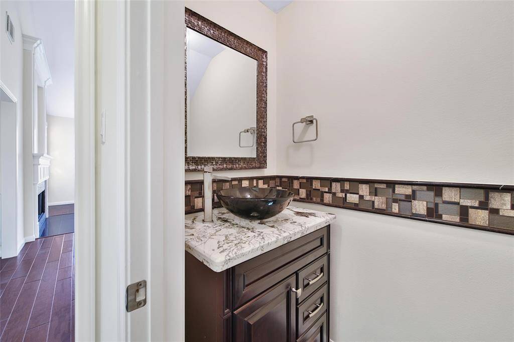 View of secondary half bathroom.