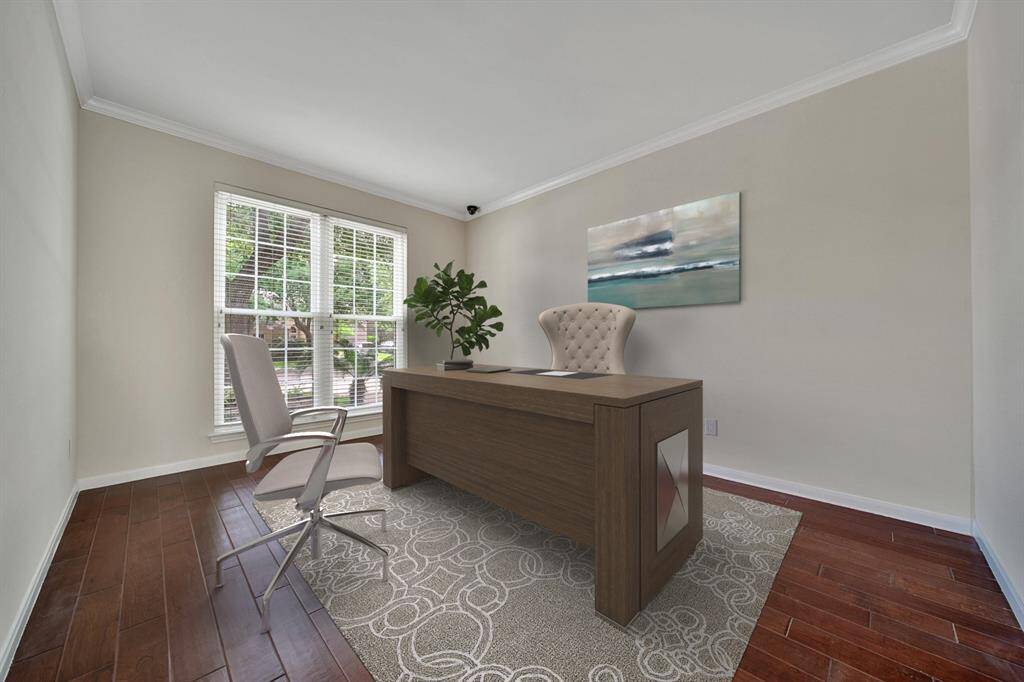 View of home office, virtually staged.