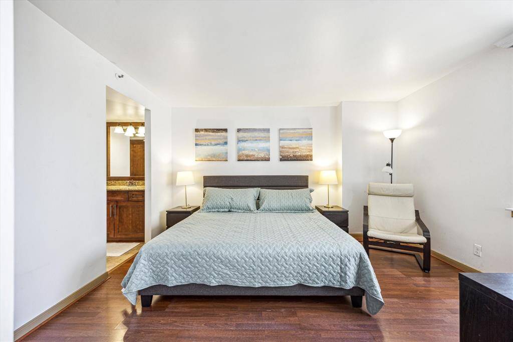 The owner's suite, complete with a private en-suite bath, features laminate flooring.