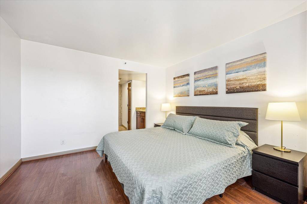 The owner's suite, complete with a private en-suite bath, features laminate flooring.