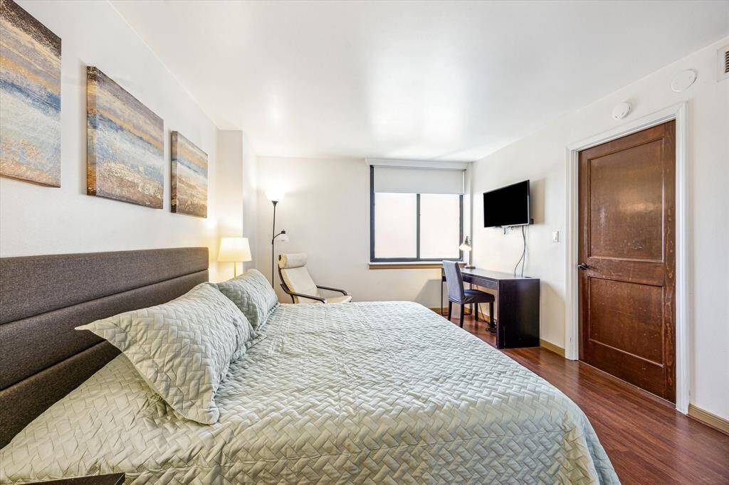 The owner's suite, complete with a private en-suite bath, features laminate flooring.