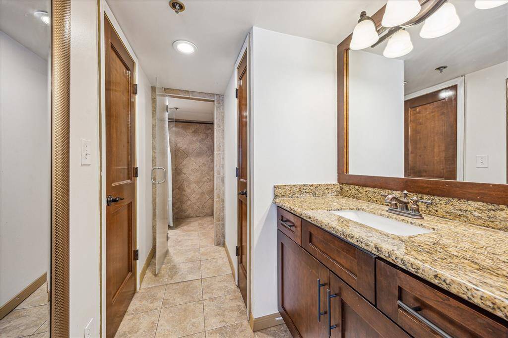 Additional view of the primary bathroom that leads to the private water closet.
