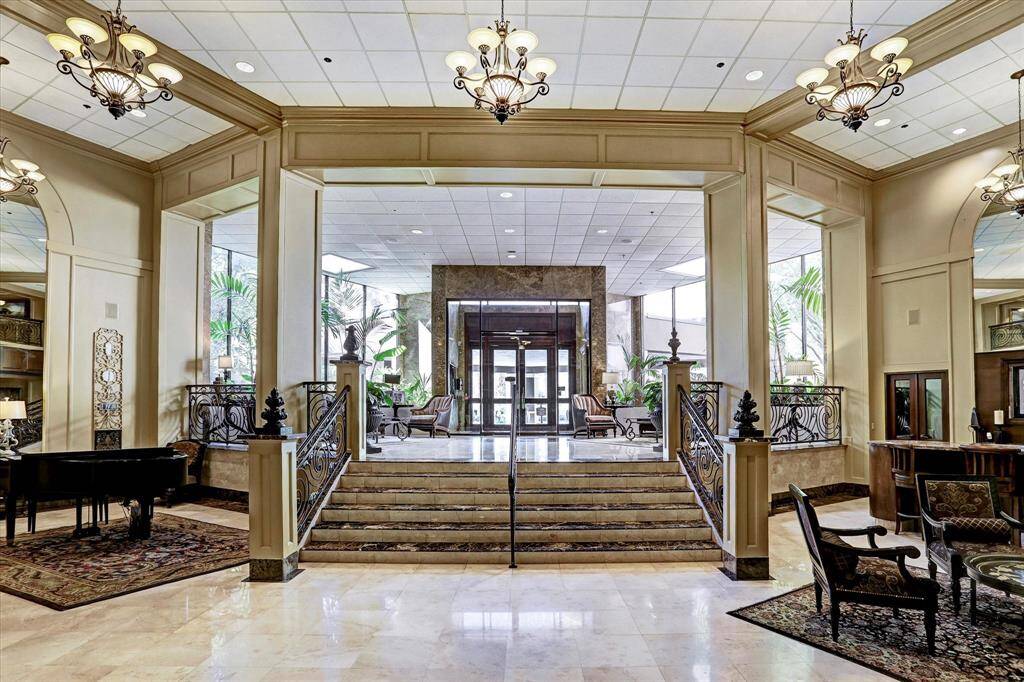 Double door entrance off of Sage Road. As you enter the building you are greeted by 24/7 concierge.
