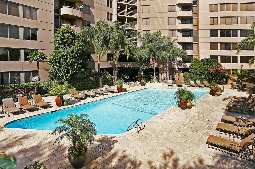 Relax by the pool and hot tub, complete with a cabana, built-in BBQ grill, and plenty of outdoor seating.