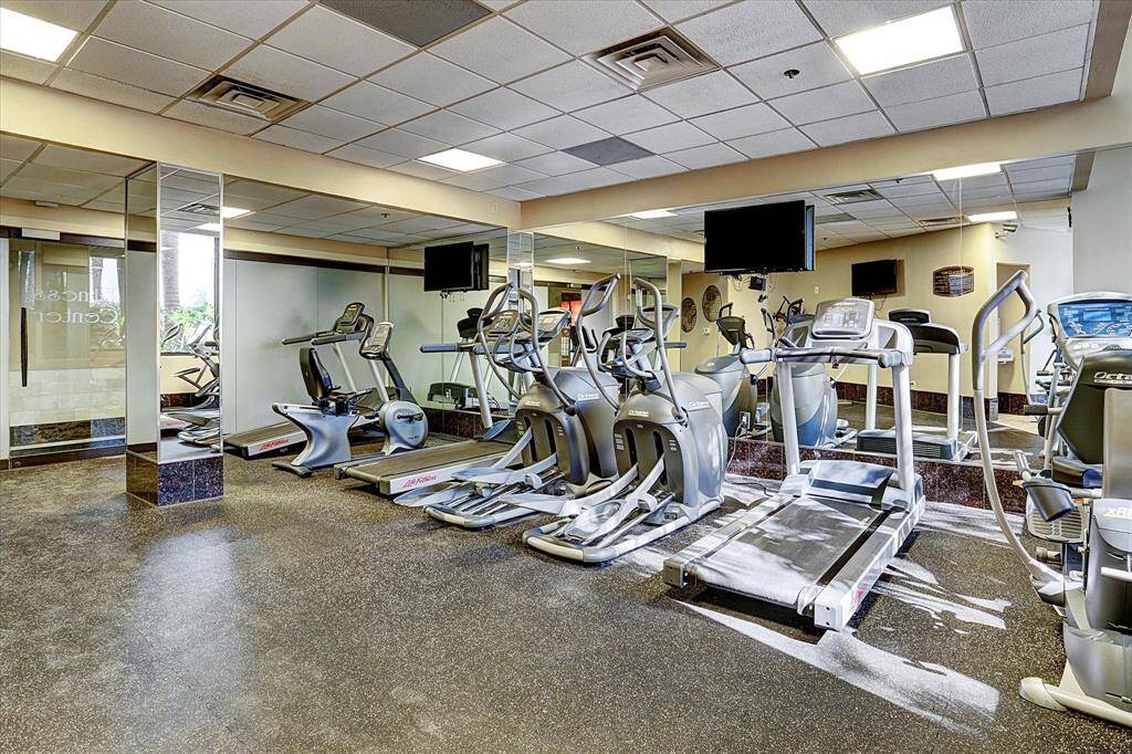 On-site gym with cardio and weight lifting equipment.