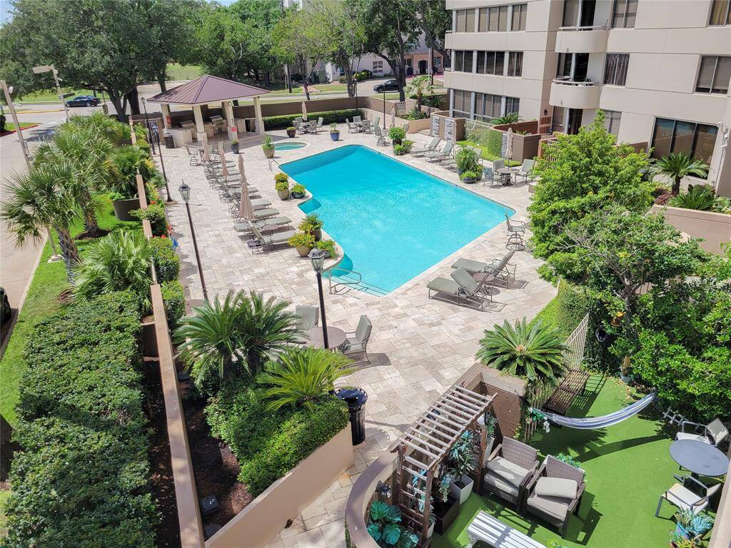 Wonderful view of the gorgeous pool and always warm jacuzzi from your unit!