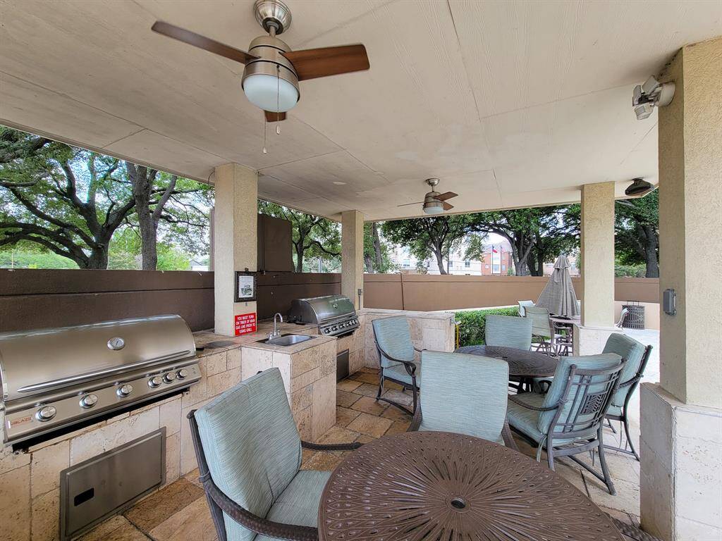 Covered Outdoor Kitchen, stainless steel grills, and sink! Are you ready to enjoy and or entertain?