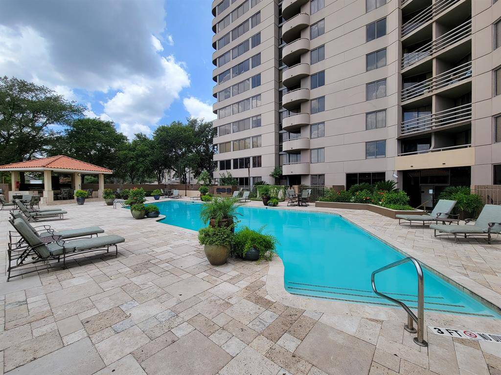 The resort feel of the Pool, Deck, and Outdoor Kitchen is so relaxing!