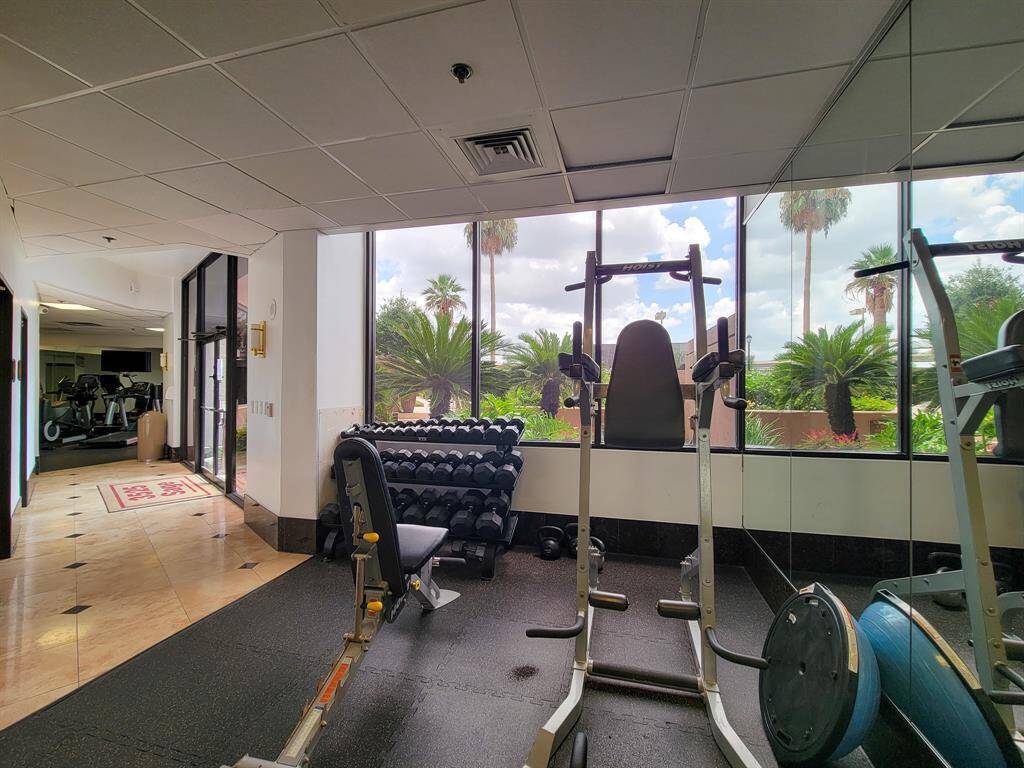 Enjoy the view while you work out! Also a set of restrooms connects the two areas.