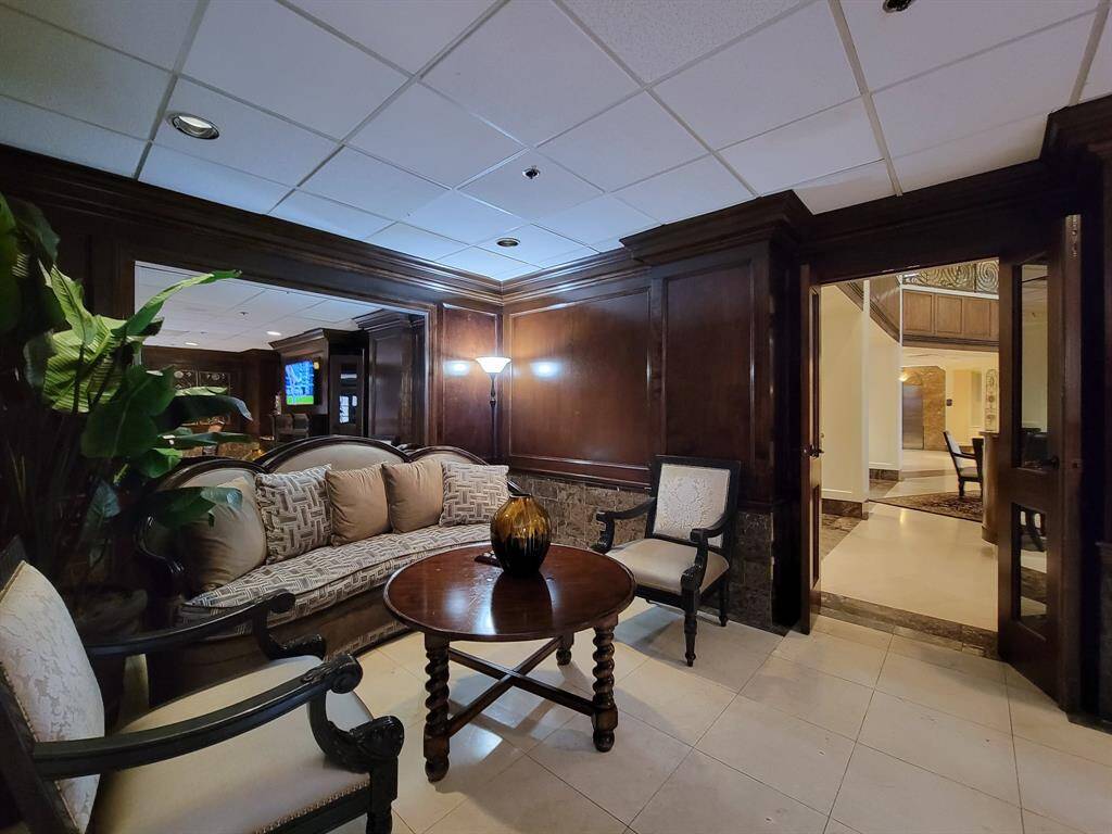 The Club Room! Fireplace and Pool table add to the appeal of this space. As well as a full Kitchen available for entertaining.