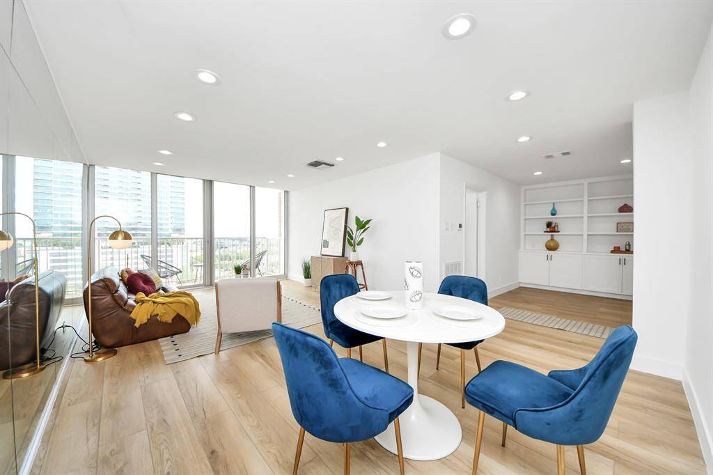 From this angle, you can see the flex space—perfect for a home office or a cozy reading nook seamlessly integrated into the open layout. The door leads into the bedroom.