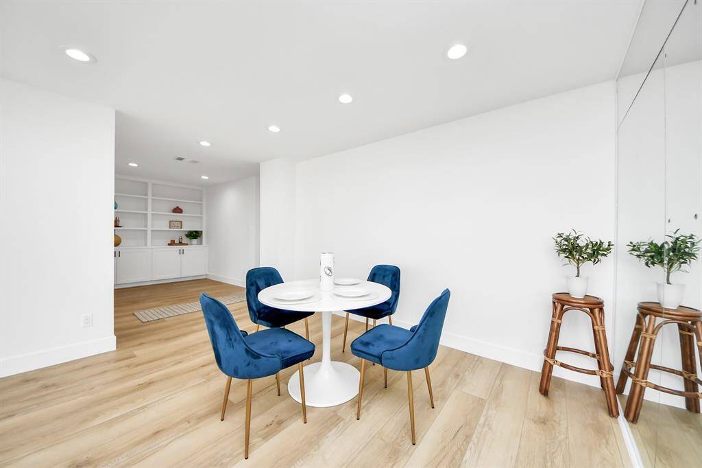 Another look at the versatile flex area—a hallway on the right leads directly to the kitchen and to the front door.