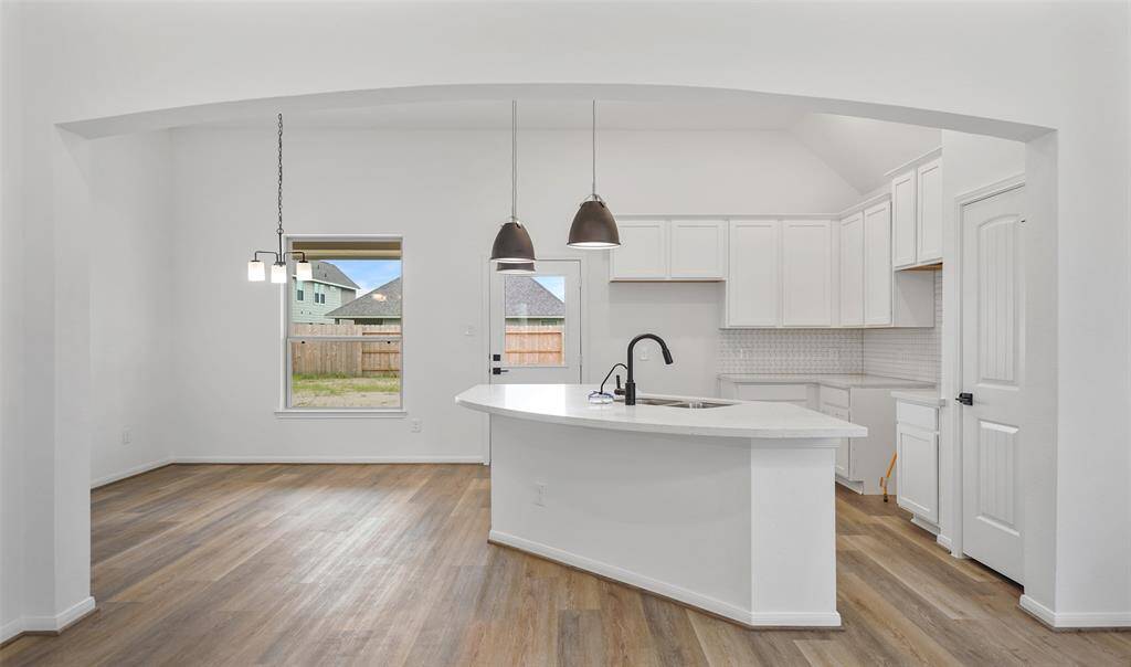 View of kitchen and dining area (*Photo not of actual home and used for illustration purposes only.)
