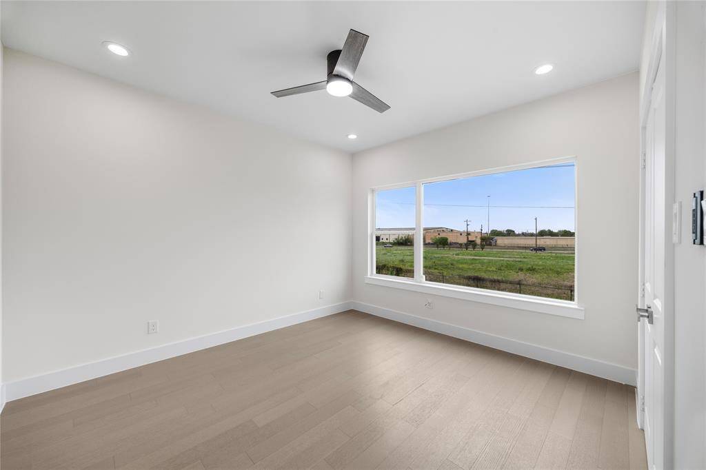 2nd Bedroom upstairs has a big window view and private bathroom.