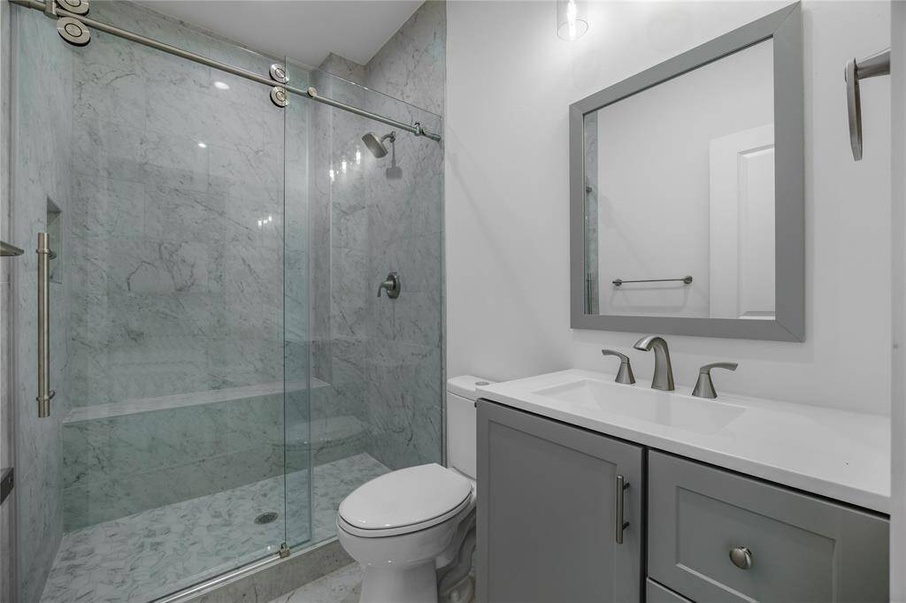 2nd bathroom with glass sliding door shower