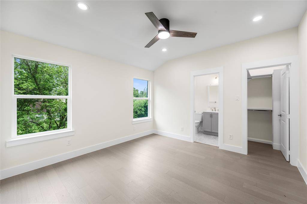 Upstairs 3rd bedroom with a two window view. What a lovely room to wake up in the morning and walk in to your own bathroom.