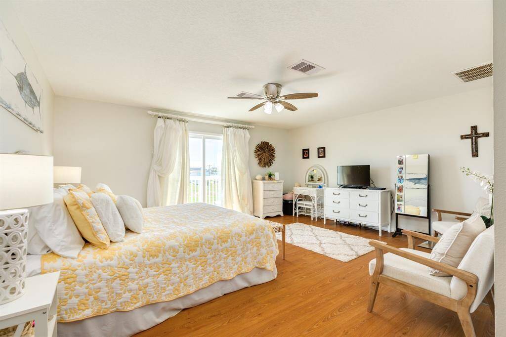 Owner’s suite with private balcony access and plenty of space to unwind.
