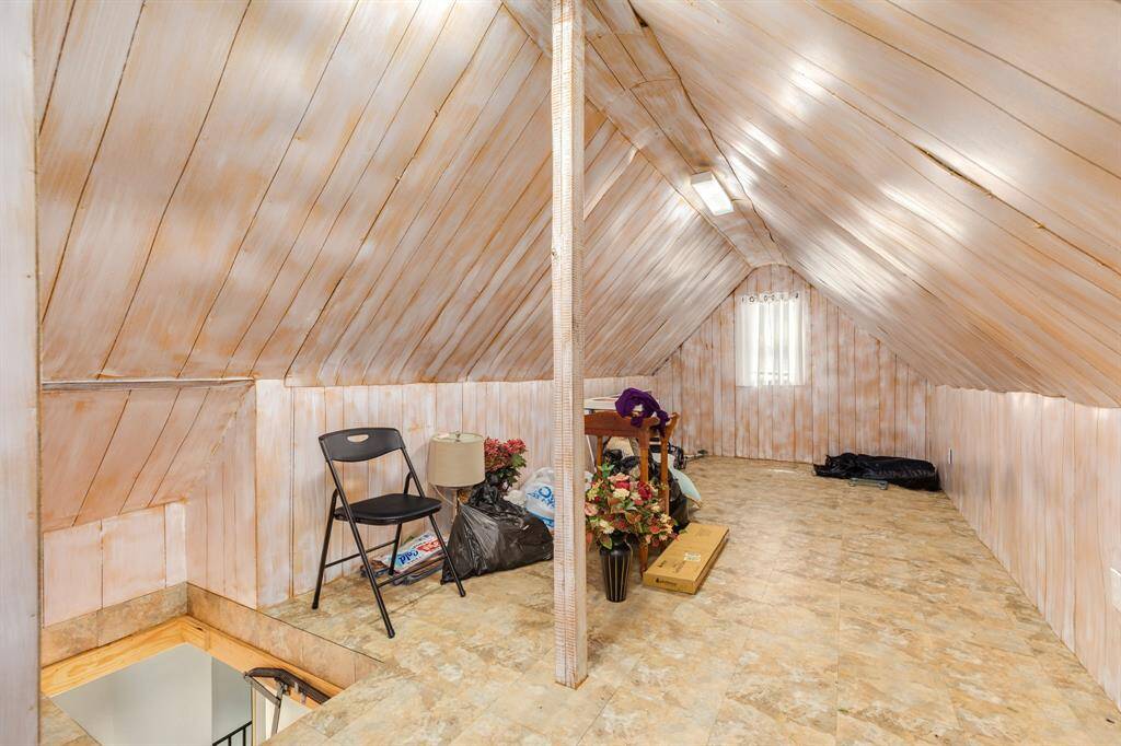 A versatile finished attic offers extra square footage and endless potential—use it as a cozy reading nook, bonus room, or creative retreat. Equipped with flooring and AC, it's ready for your imagination.
