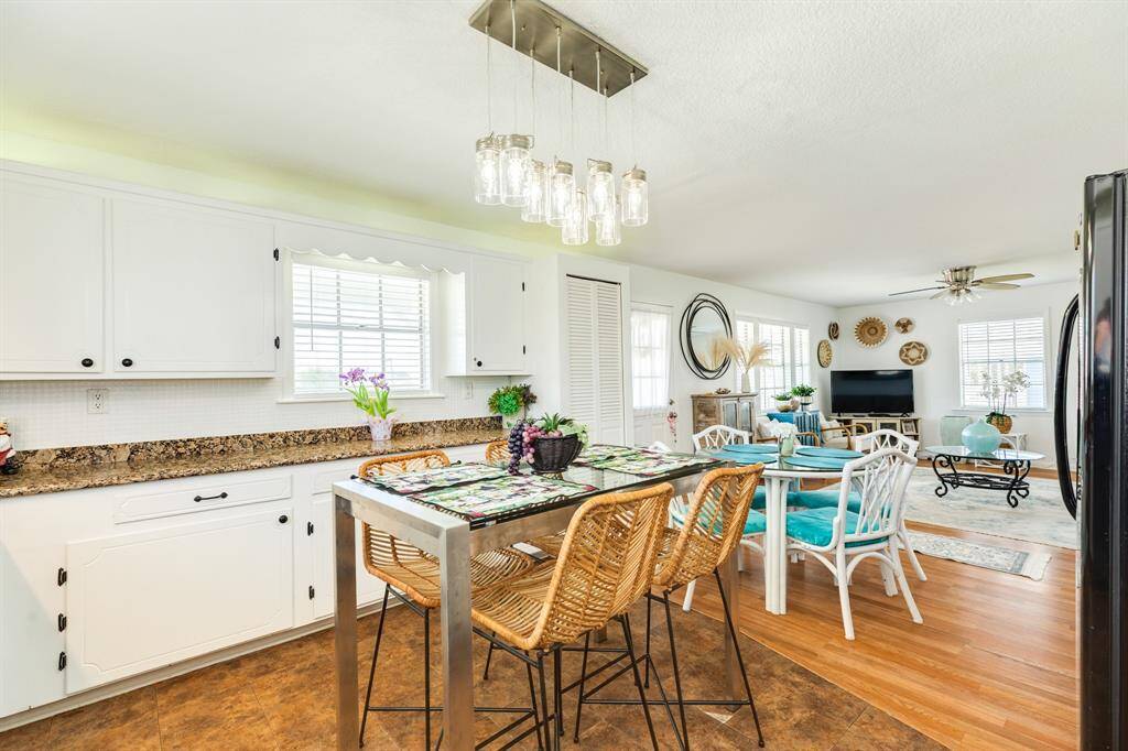 Charming flow from kitchen to living and dining—perfect for gathering and entertaining.
