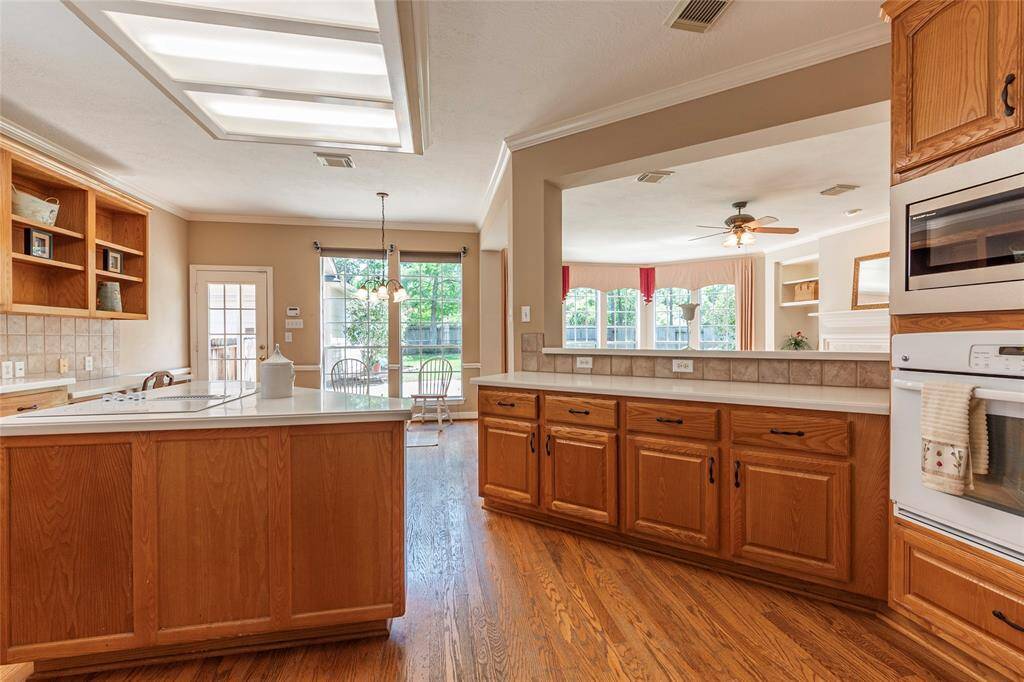 Built in oven and microwave with breakfast bar overlooking the living room.