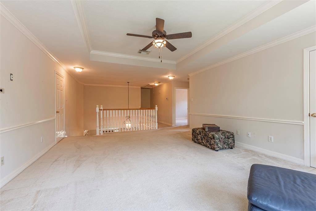 Walk-in attic to left with attic storage space.
