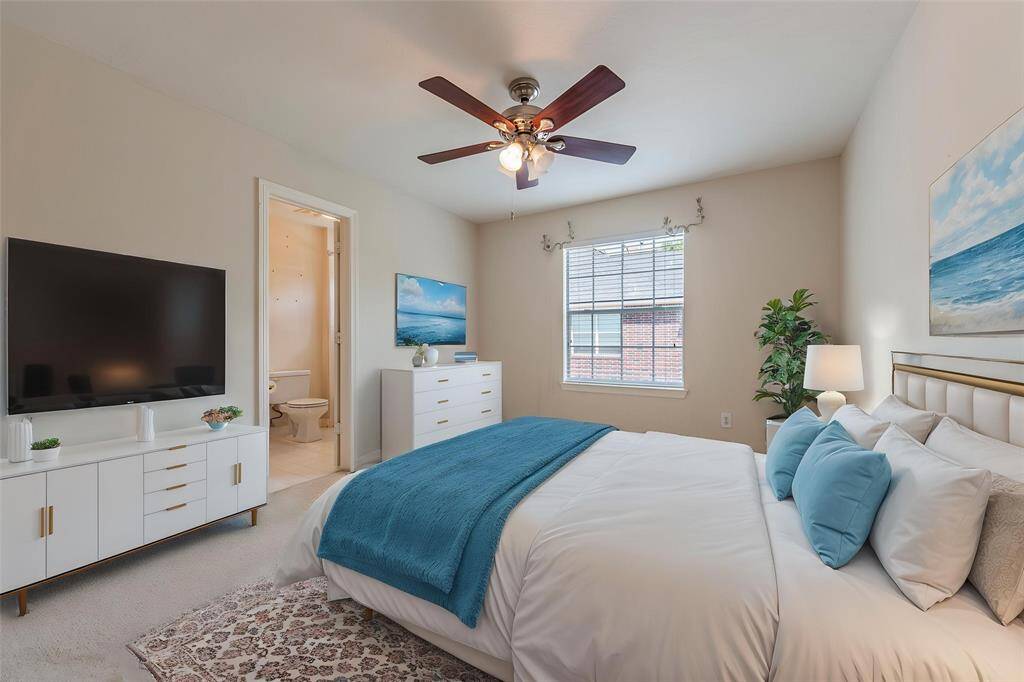 Virtually staged spare bedroom.