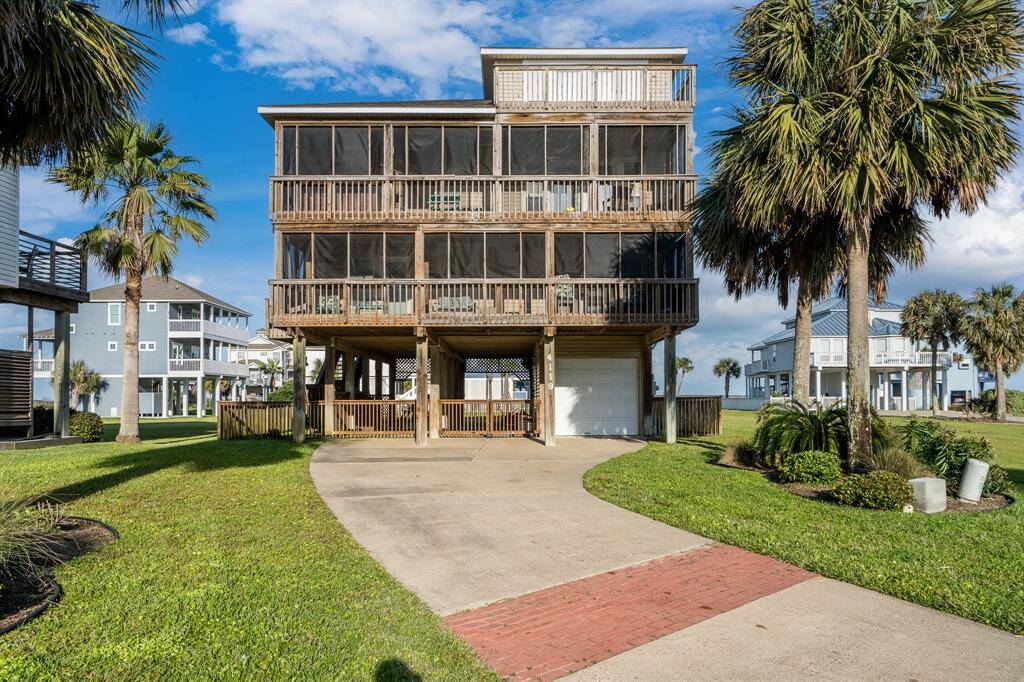 Enjoy two levels of screened-in porches at the front of the home, perfect for relaxing with sunset views and evening breezes.