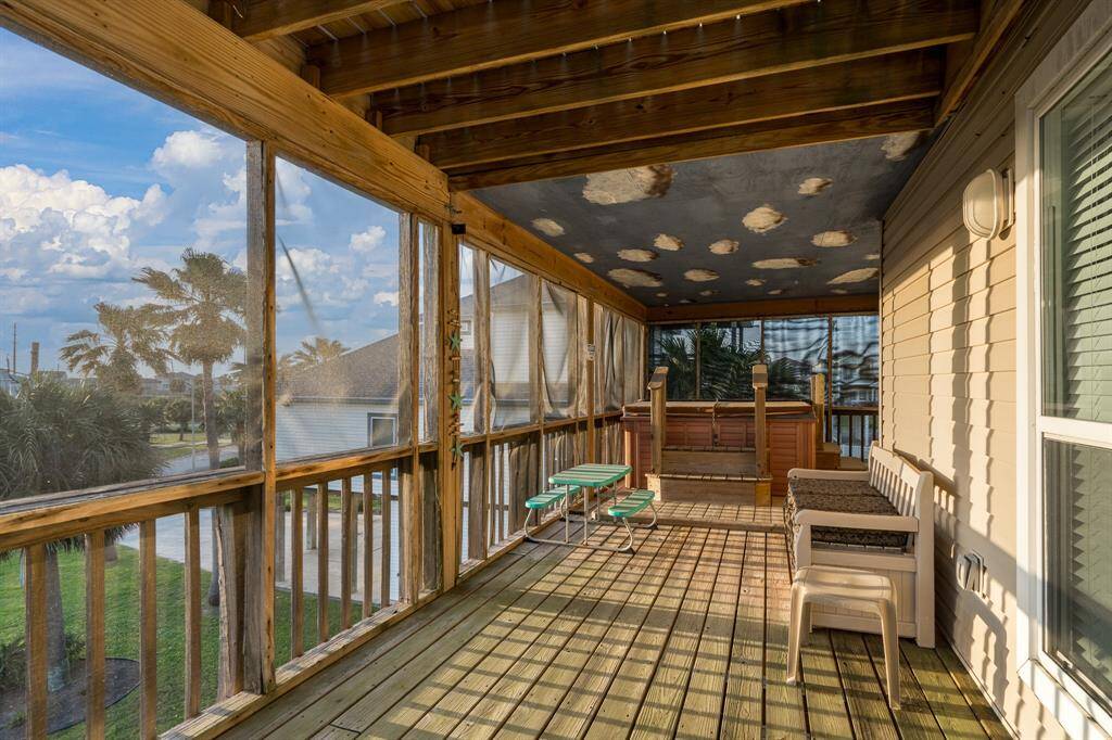 This view of the spacious screened-in deck shows just how ideal it is for both relaxation and entertaining, with plenty of room to unwind or gather with family and friends.