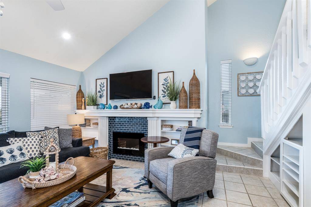 Enjoy the warmth and glow of the electric fireplace, creating the ideal ambiance for those crisp, cool days.  Plus storm doors throughout the home for added peace of mind.