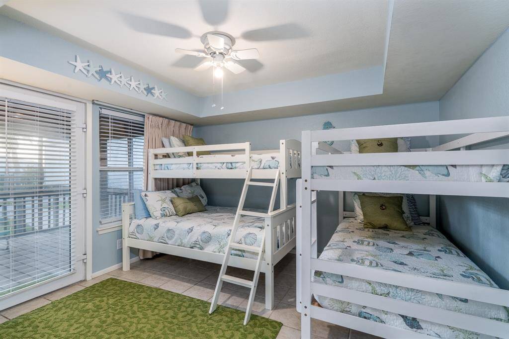 The first-floor bunk room is a fun and flexible space—perfect for kids, sleepovers, or extra guest accommodations.