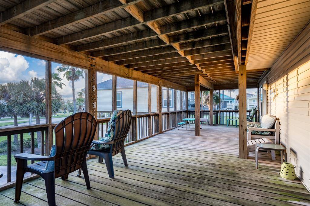 This oversized screened-in balcony on the first floor offers the perfect place to unwind, rain or shine, in a peaceful, protected setting.