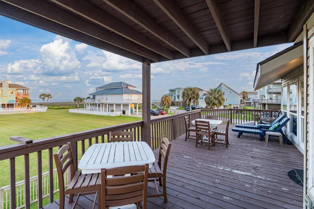 Another inviting first-floor balcony offers stunning ocean views, perfect for quiet moments or soaking in the coastal beauty.