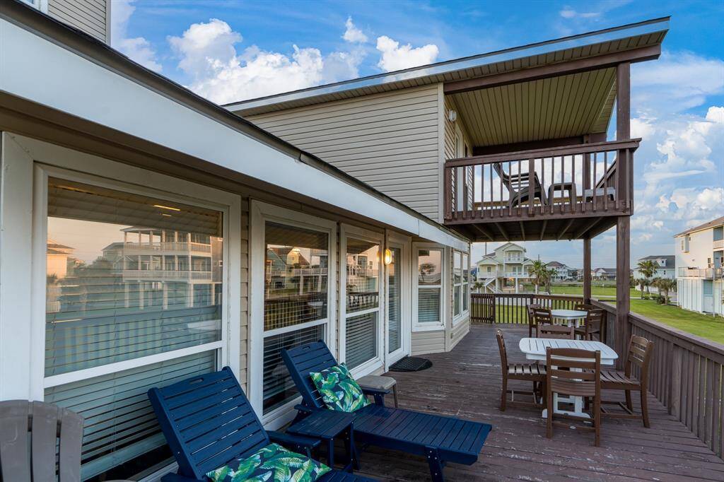 The front door is ideally located off the first-floor balcony, where you can enjoy stunning ocean views every time you step outside.