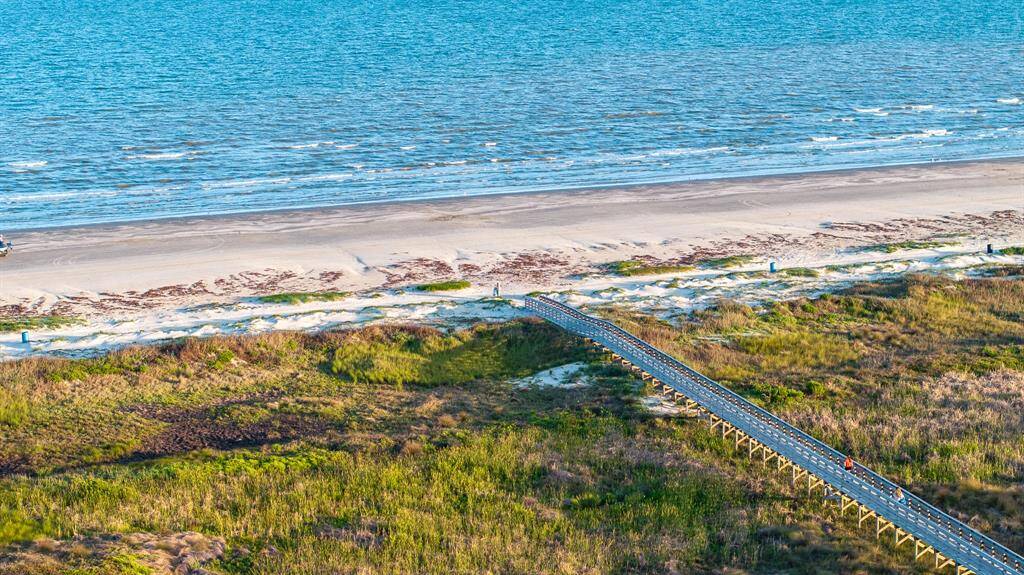 Just steps from the home, enjoy your own direct pathway to the sand and surf.