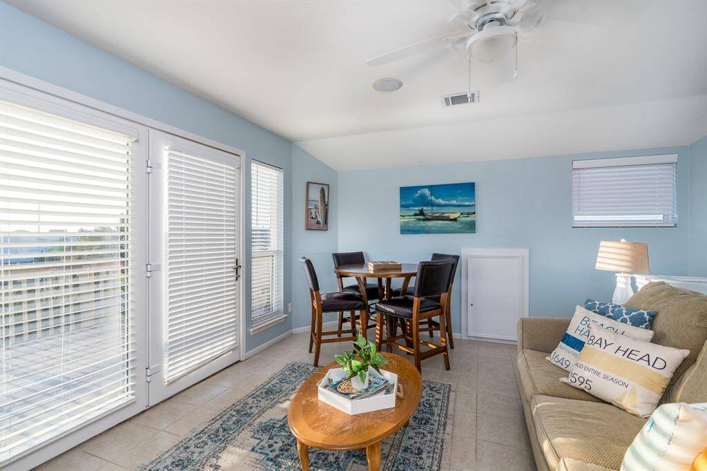 Escape to the third-floor flex/bedroom with its own private balcony—a quiet haven with gorgeous sunset views and total tranquility.