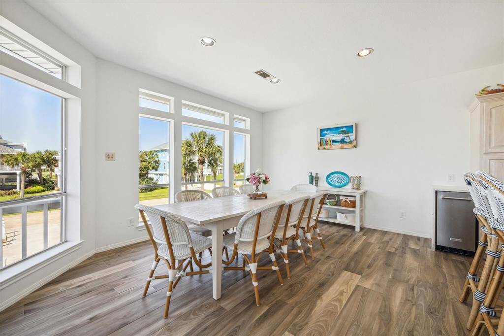 The spacious dining room has beautiful views and easy access into the kitchen for entertaining and meals.