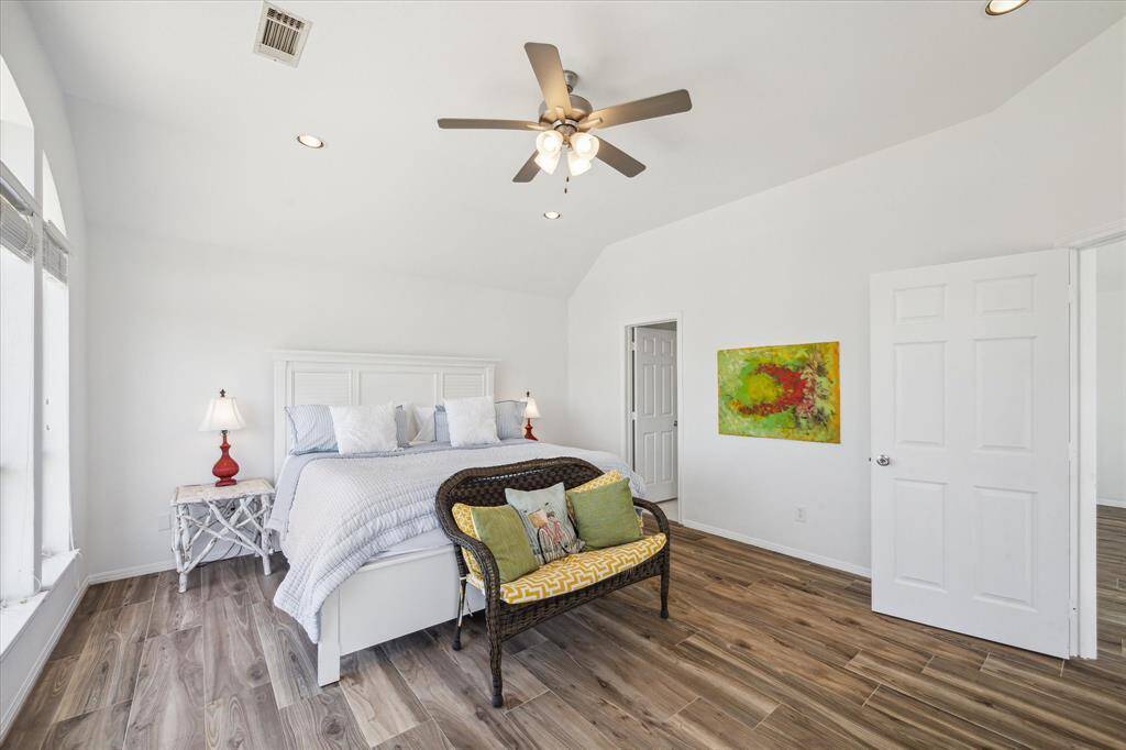 Located on the 2nd floor, this ensuite guest room can also be used as an additional primary suite.  The spacious room also has access to a private deck with ocean views.